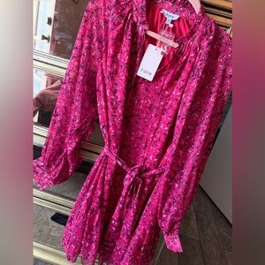 Colorful hot pink leopard print dress with sheer sleeves. Great knee length